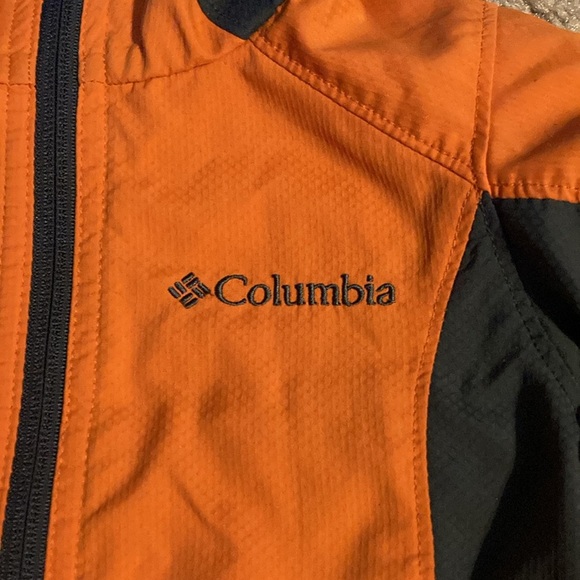 Columbia orange and grey jacket with a few marks on the cuff. - Picture 2 of 8